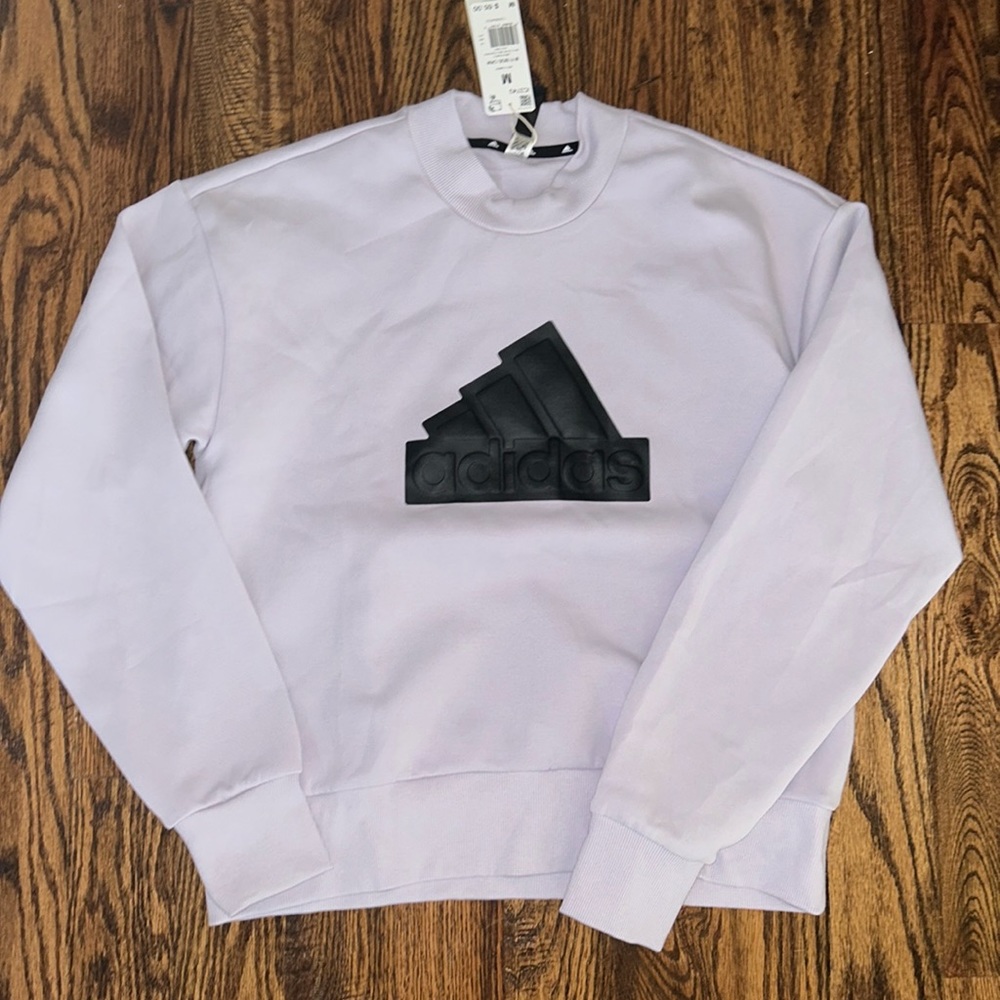 Brand new Adidas unisex crew neck, light purple, size medium in men’s